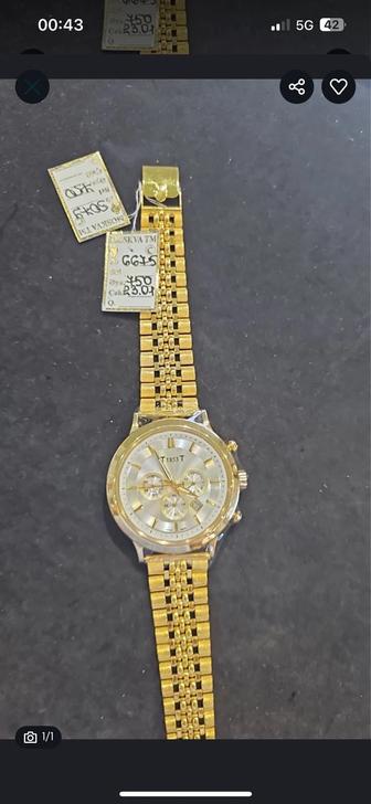 Продам золотые часы Tissot