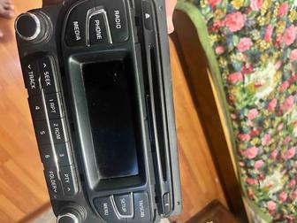 Продам оригинал магнитолу на Киа