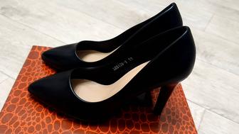 Продам новые туфли