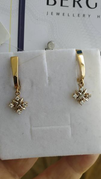 Продам золотые серьги