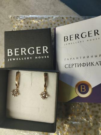 Продам золотые серьги