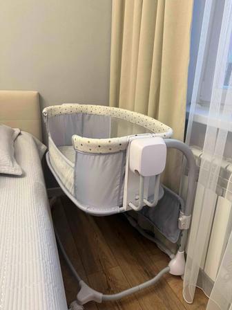 Электронная детская кроватка