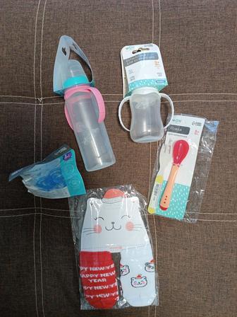 Бутылочки и соска для новорожденного