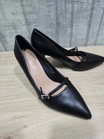 Продам кожанные туфли