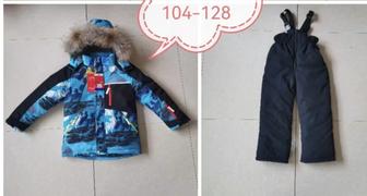 Куртки , пуховики