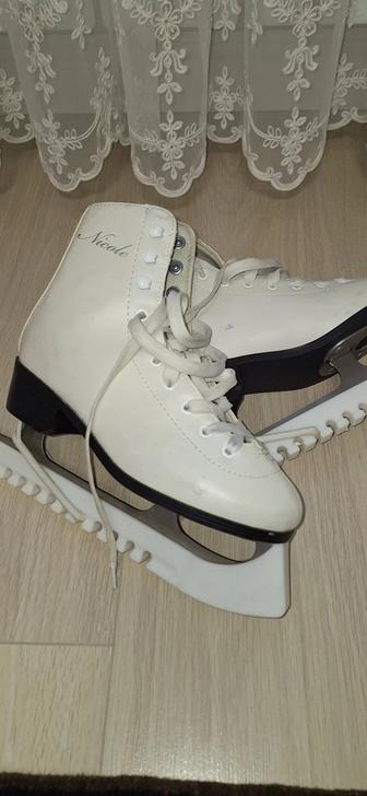 Коньки фигурные женские