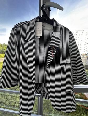 Продам новый женский брючной костюм