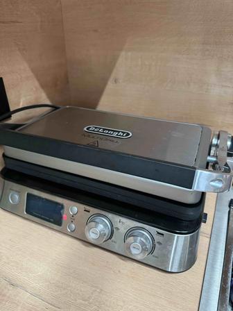 Мультигриль DeLonghi CGH1030D