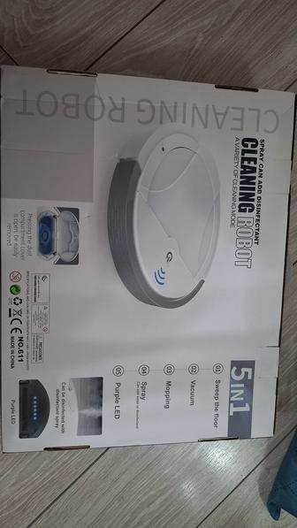 Робот-пылесос.