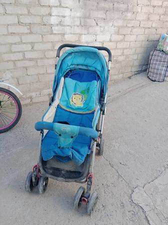 Коляска бу