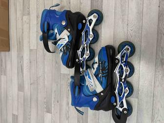 Роликовые коньки