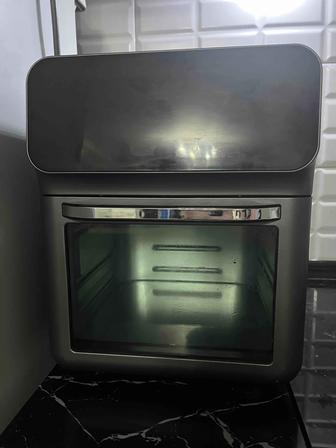 Срочно продаю настольную электропечь Deylinghs HD15L01 (черная)