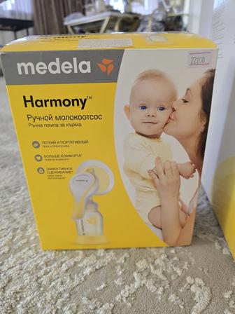 Молокоотсос Medela