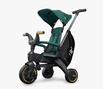 Продам трехколесный велосипед Doona Liki Trike S5 зеленый