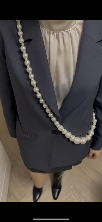 Многослойная линия жемчуга с разным калибром бусин