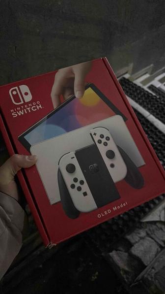 Продам игровая приставка Nintendo Switch Oled состояние новая