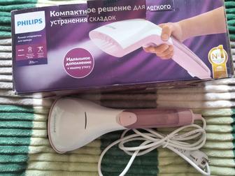 Ручной отпариватель.