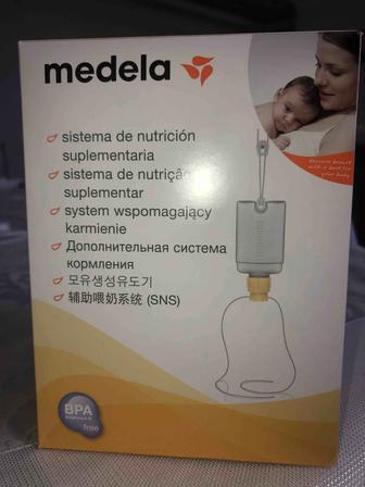 Дополнительная система кормления от Medela