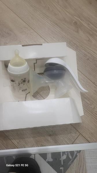 молокоотсос фирмы Nuk