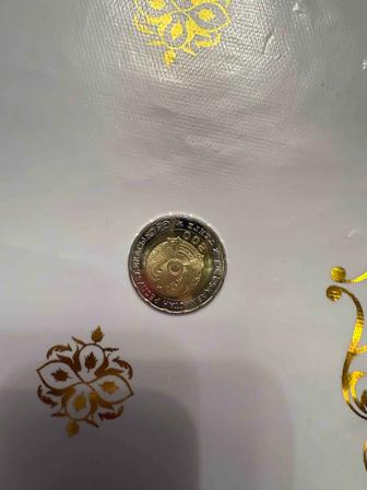 Продам монету номиналу 200 тг