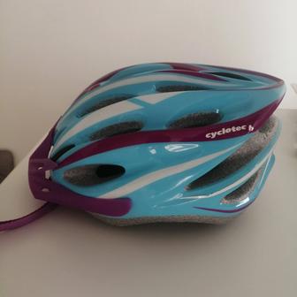 Продам велосипедную каску от Sportmaster. Цвет голубой - фиолетовый.