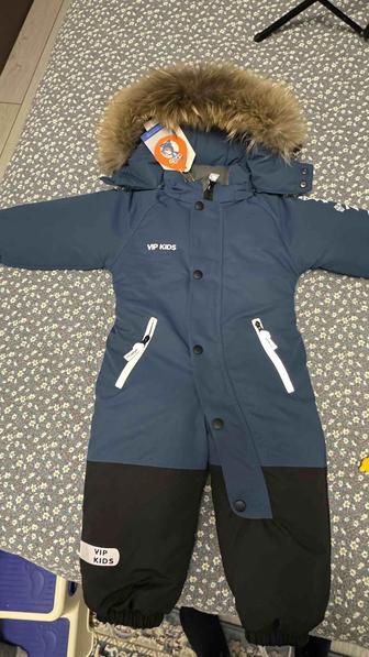 Продет детский комбинезон