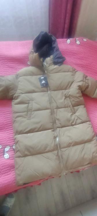 Продам новую куртку