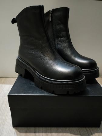 Продам зимние ботинки