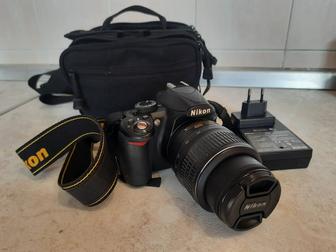 Продам комплект фотоаппарат Nikon D3100, объектив, чехол