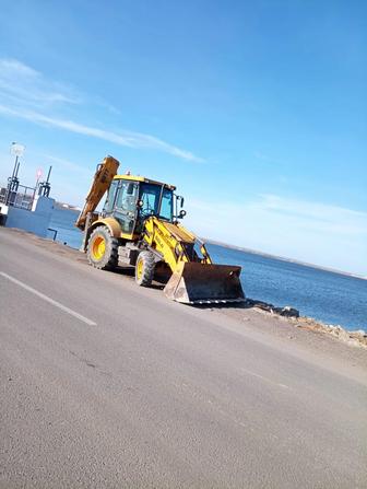 Услуги экскаватор-погрузчика