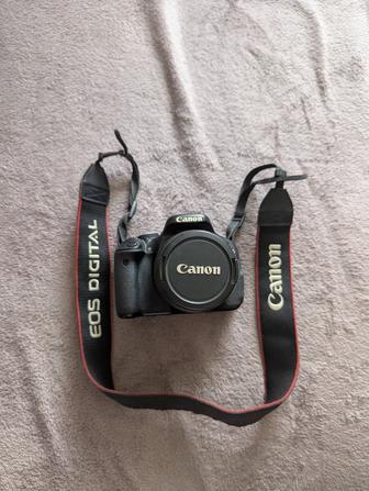 Продам фотоаппарат Canon EOS Rebel T3i с объективом 18-55мм и сумской