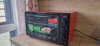 Продам духовку Artel