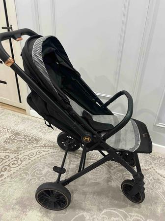 Продам коляску, шезлонг качалку, ходунок, толокар