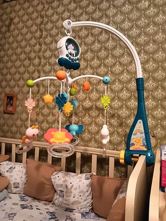 Продам музыкальную игрушку на кроватку