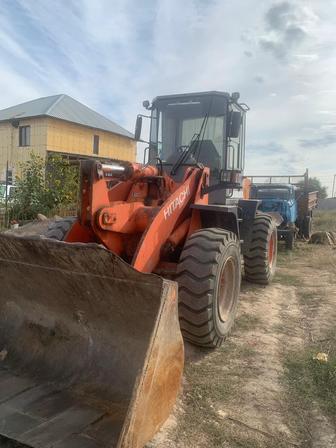 Услугу Фронтального погрузчика с опытным водителем