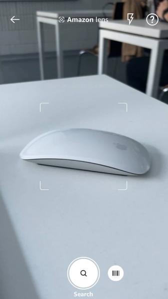 Magic Mouse — белая мультитач-поверхность