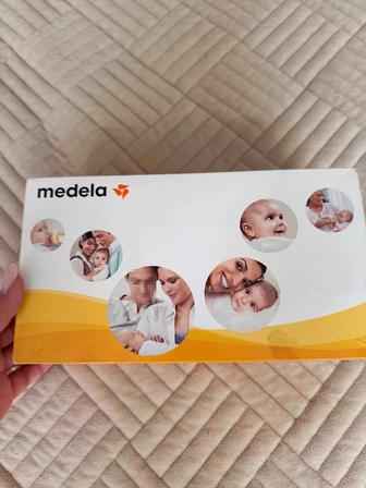 Молокоотсос Medela механический