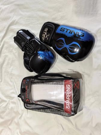 Продам боксерские перчатки Sting
