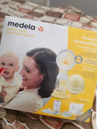 Молокоотсос Medela