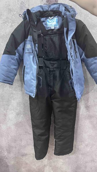 Продам зимний комбинезон Lassey