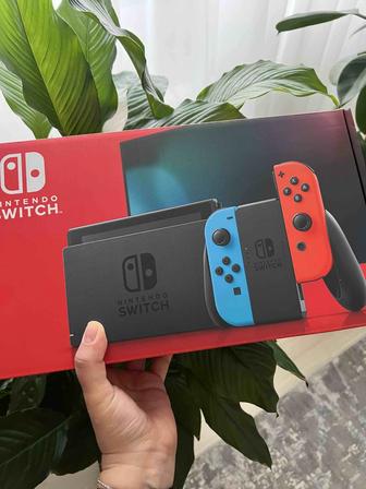 Продам игровую приставку Nintendo Switch OLED