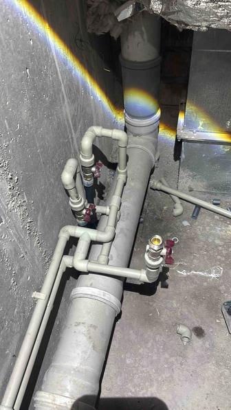 Сантехник Каиржан с бригадой