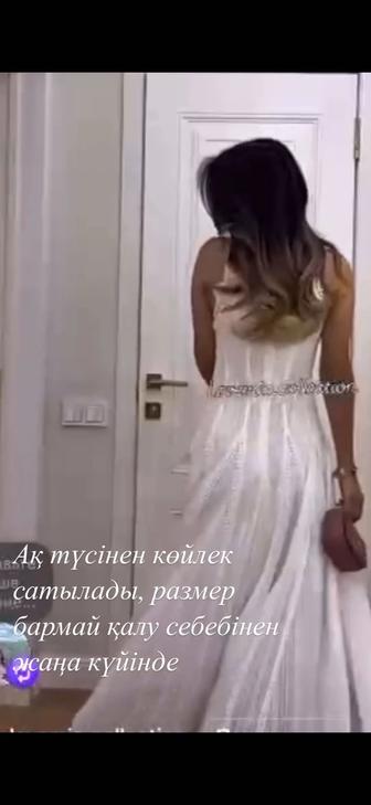 Платья