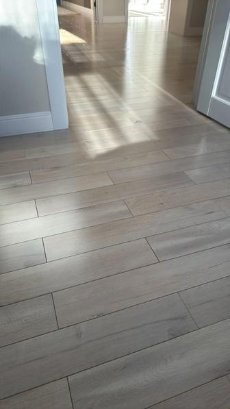 Укладка ламината и установка плинтусов