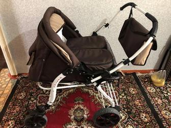 Двухместная коляска