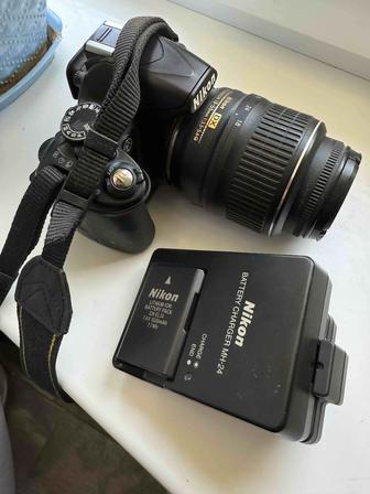 Продам фотоаппарат Nikon D3100 в хорошем состоянии с адаптером для зарядки