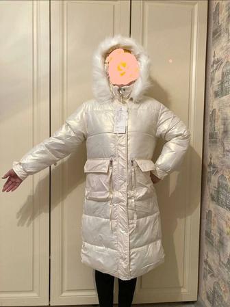 Продам женский пуховик новый цвет айвори