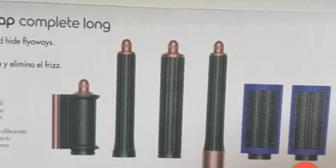 Продам фен Dyson стайлер новый .шесть насадок в подарок расческа.