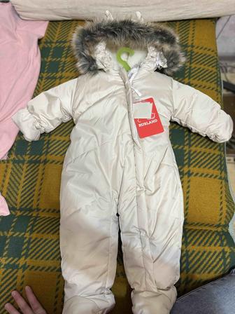 Продам новый зимний комбинезон