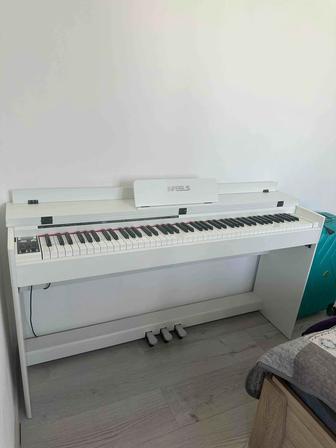 Продам цифровую пианино